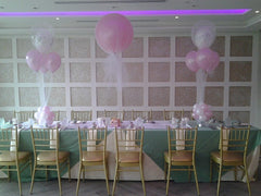 Large 2 FT latex balloon wrapped in tulle with clear topper centerpiece