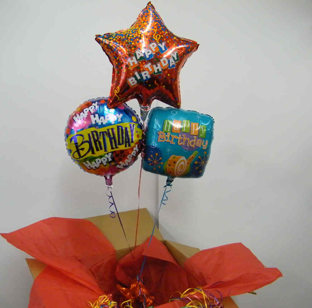 Balloon in a Box Trio Bouquet with three mylar balloons, candy, and greeting card
