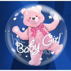 Pink baby balloon centerpiece with a teddy bear in a bubble