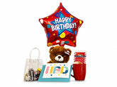 Balloon in a Box with a mylar happy birthday star shaped balloon, assorted mix candy, teddy bear, ceramic mug with hot chocolate mix and personalized greeting card