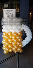 Beer mug balloon sculpture with gold and white latex balloons for party decor