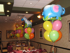 Day at the Circus balloon centerpiece with colorful 11 Inch latex balloons and Mylar top