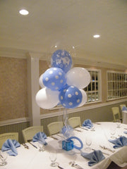 Whimsical balloon cloud centerpiece with streamers and tulle, white and blue latex, table decor
