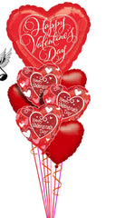Valentine’s Day singing balloon bouquet with supersized heart mylar and five 18-inch heart mylars on mylar weight