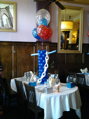 Anchor balloon sculpture with clear top bubble, large latex balloons, nautical party decor