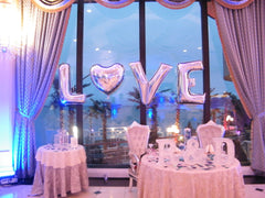 Large colorful mylar letter balloons for party decor