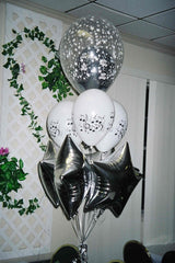 music under the stars balloon bouquet with silver mylar stars, music note latex, and clear star balloon