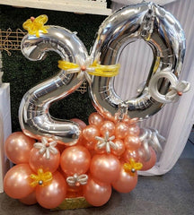 Colorful latex balloon sculpture with large number mylar balloon topper for party decoration