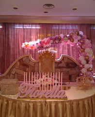 Colorful organic L-shape balloon arch with flowers for event decor