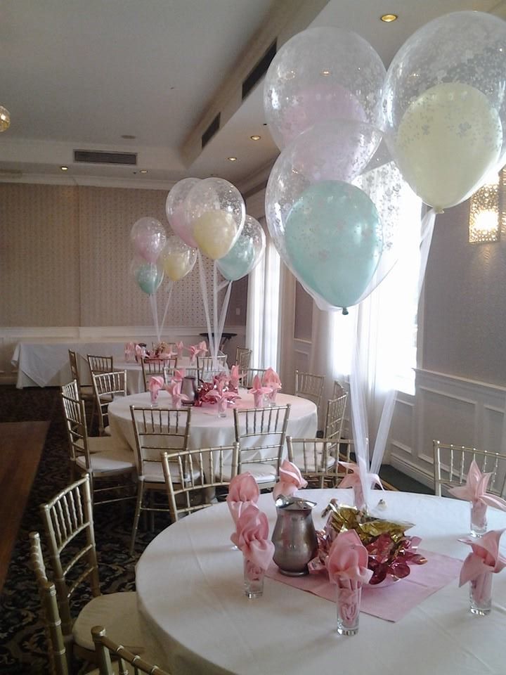 Balloon centerpiece display with colorful latex and bubble balloons for all occasions