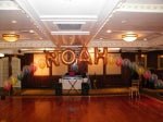 Personalized balloon arch with colorful latex balloons and custom mylar letters