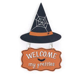 Reversible witch hat wall hanging with black wooden hat and orange sign reading “Welcome my pretties” for Halloween décor