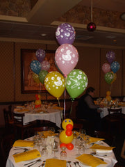 Colorful rubber duck balloon bouquet with latex balloons, perfect for baby shower décor