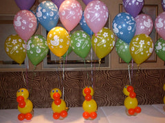 Adorable rubber duck themed latex balloon centerpiece for newborn celebrations