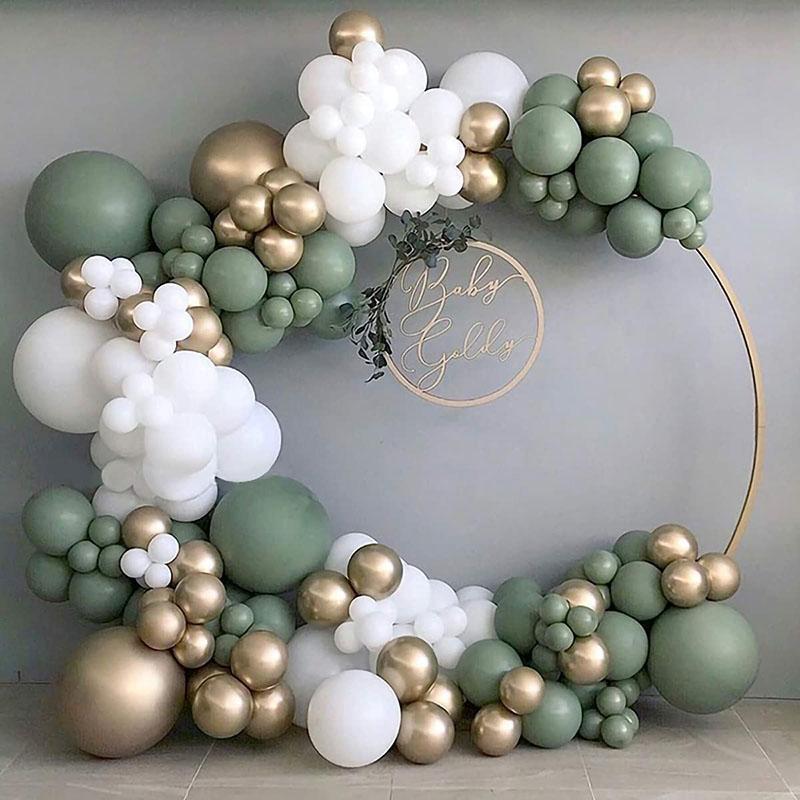 Organic semi circle balloon arch with pastel balloons on round frame, perfect for event decoration