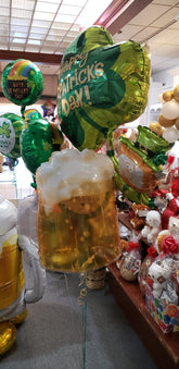 St. Paddy’s Day balloon bouquet with green and gold latex balloons and shamrock mylar accents
