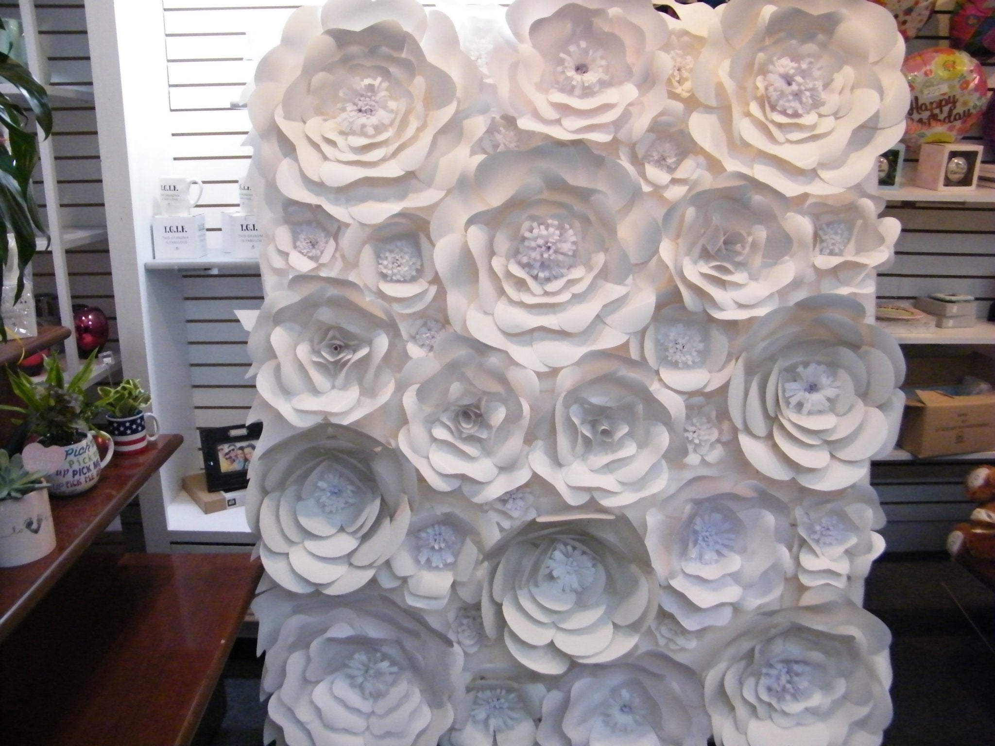 white paper roses flower wall backdrop for weddings and events