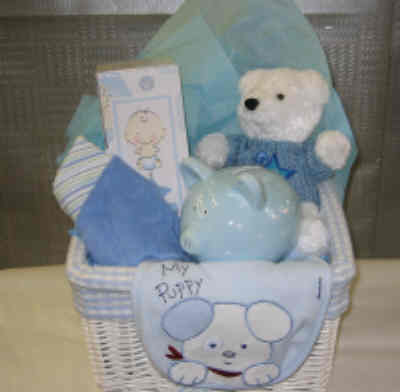 baby boy gift basket with bib hat teddy bear piggy bank and picture frame