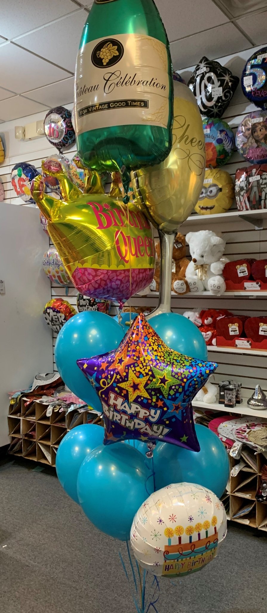 Happy Birthday Queen Balloon Bouquet with champagne, crown, star, and latex balloons