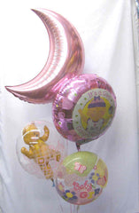 Deluxe It’s a Girl balloon bouquet with pink moon, bubble bear, and mylar balloons