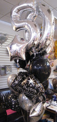 Silver number balloon bouquet with black and silver accent balloons