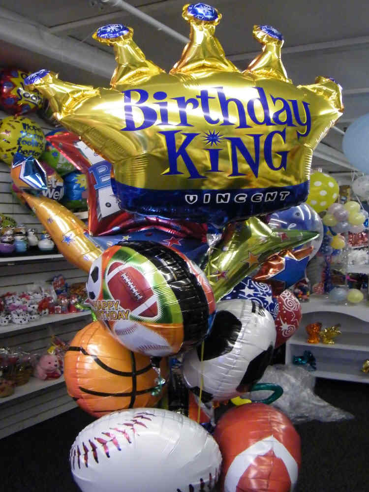Happy Birthday Sports King balloon bouquet with crown and sports balloons