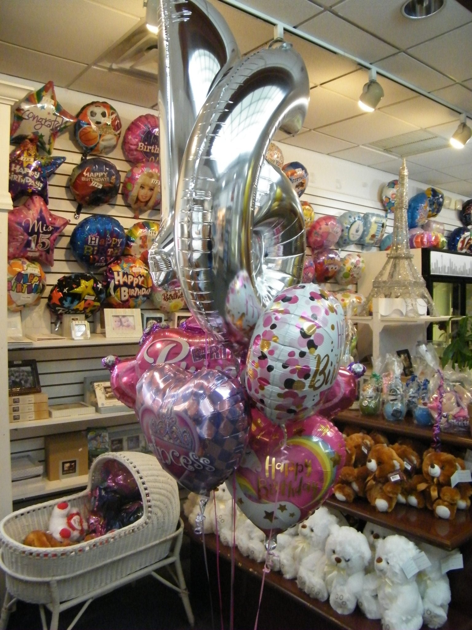Sweet Sixteen princess balloon bouquet with large number 16 and Happy Birthday balloons