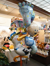 New baby balloon bouquet with giant stork balloon, jumbo new baby balloons, teddy bear, and welcome baby designs