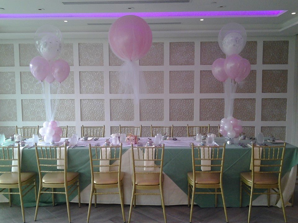 Large 2 FT latex balloon wrapped in tulle with clear topper centerpiece