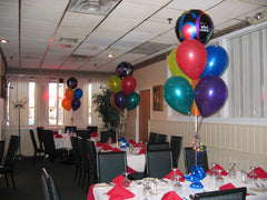 Colorful balloon centerpiece with six 11 Inch latex balloons and 1 orb mylar balloon topper