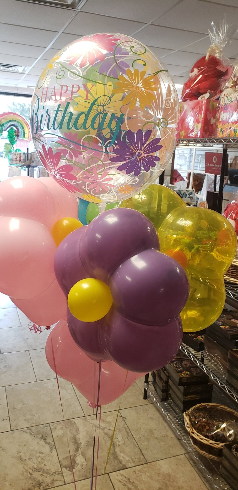 Colorful balloon daisy centerpiece with floral bubble topper, table decoration, party décor