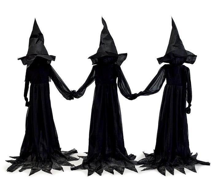 Three joined witches Halloween decoration in black outfits and black hats, lighted and ideal for indoor or outdoor use