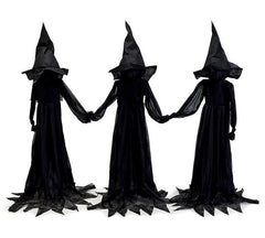 Three joined witches Halloween decoration in black outfits and black hats, lighted and ideal for indoor or outdoor use