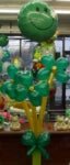 St. Patrick’s Day balloon bouquet in a green polka-dot vase with smiley face mylar balloon