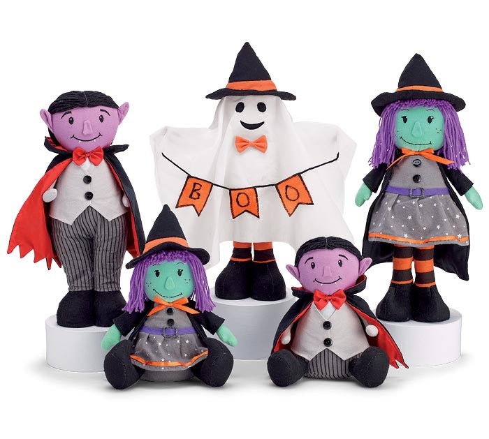 Halloween plush decorations featuring friendly witches, Dracula, and a ghost, made from fabric, felt, and yarn, perfect for festive home décor.