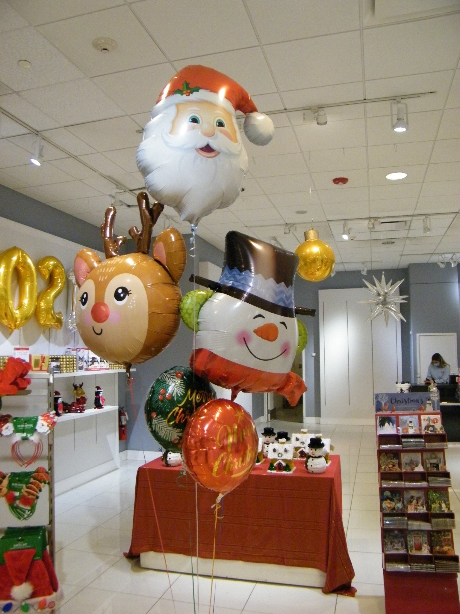 Santa, Reindeer, and Snowman Balloon Bouquet featuring oversized Christmas holiday balloons