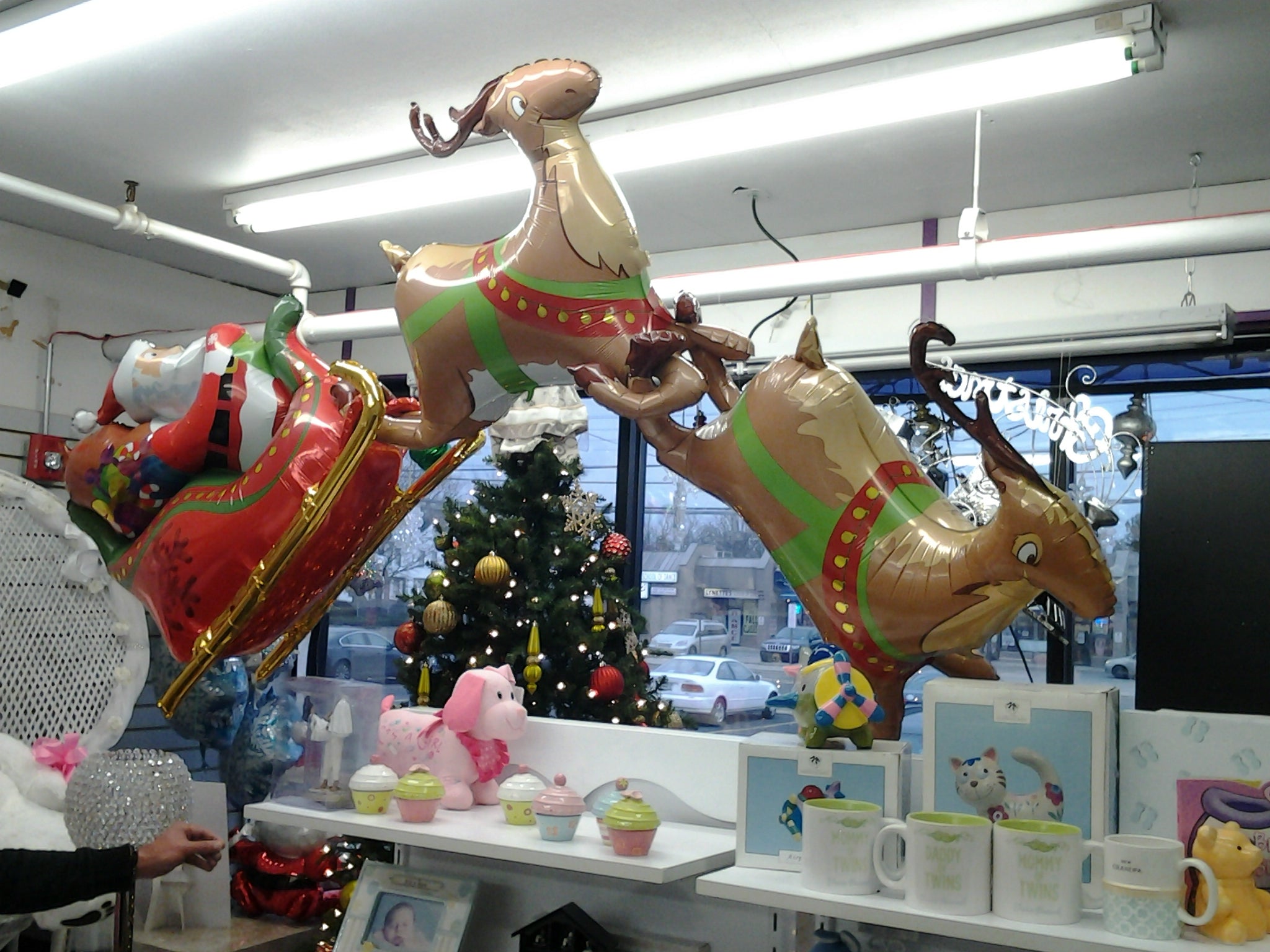 Santa and His Reindeer Balloon Bouquet featuring 3D Santa and reindeer holiday balloons