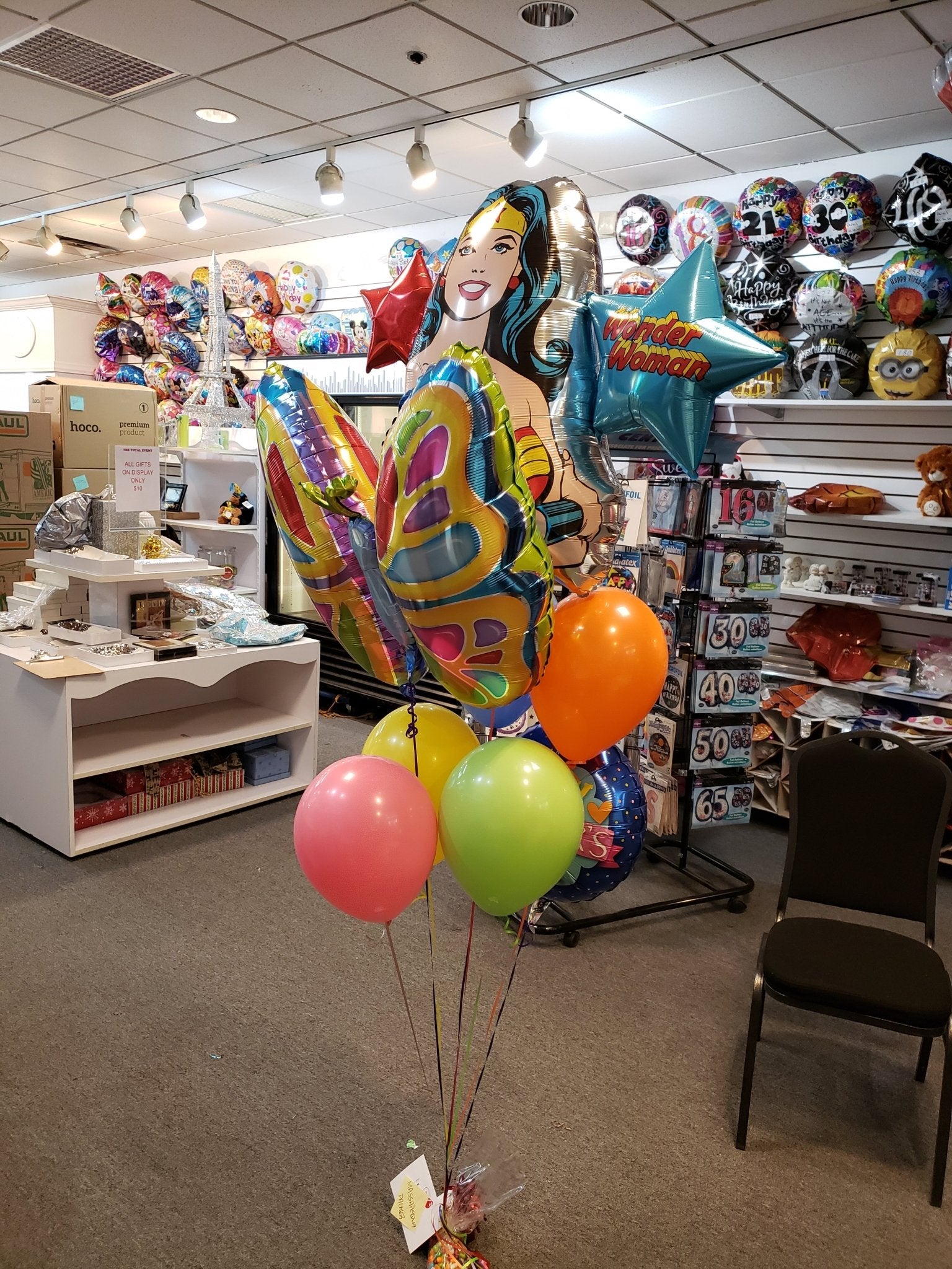 Wonder Woman Mother’s Day Balloon Bouquet with butterfly, latex, and mylar balloons